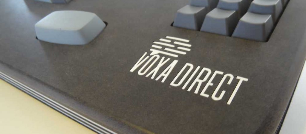 Logo Voxa Direct sur le clavier pour la Vélotypie
